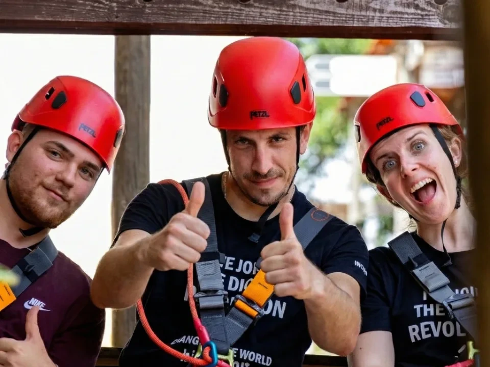 group enjoying outdoor adventure helmets
