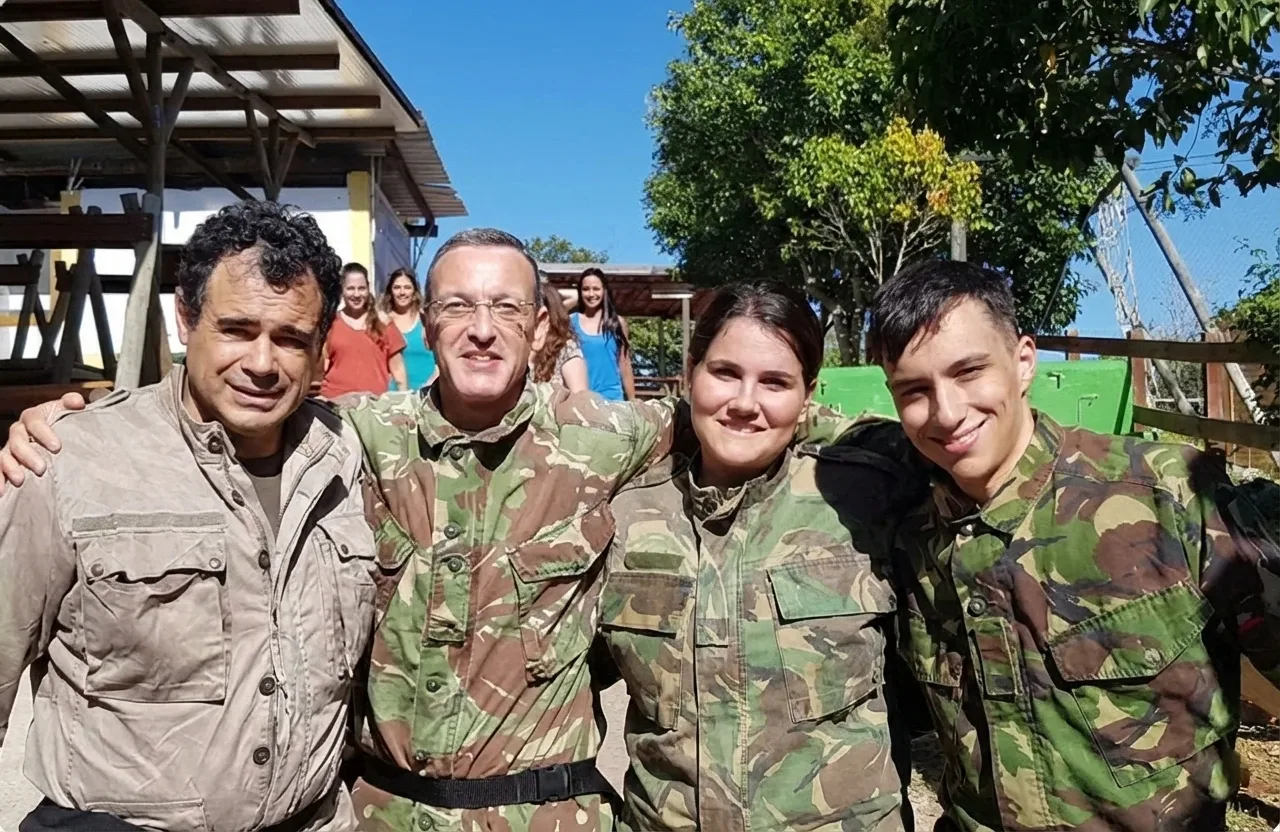 group of people in camouflage clothing