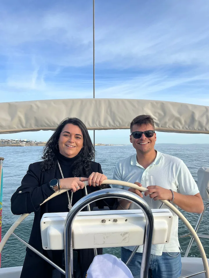 sailing smiling people on boat sea