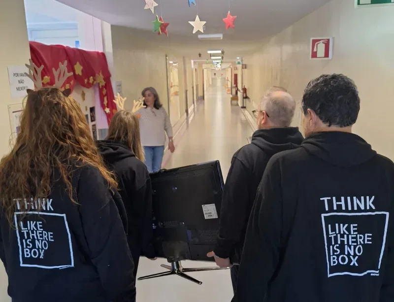 group delivering gifts in hallway