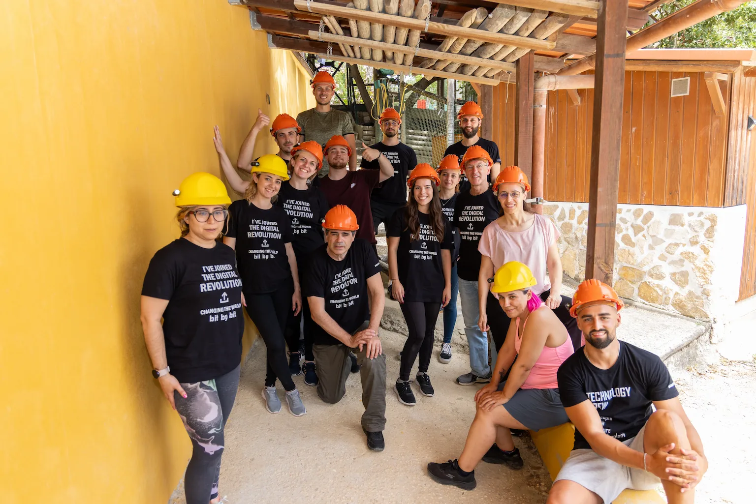 group volunteers wearing helmets outdoor