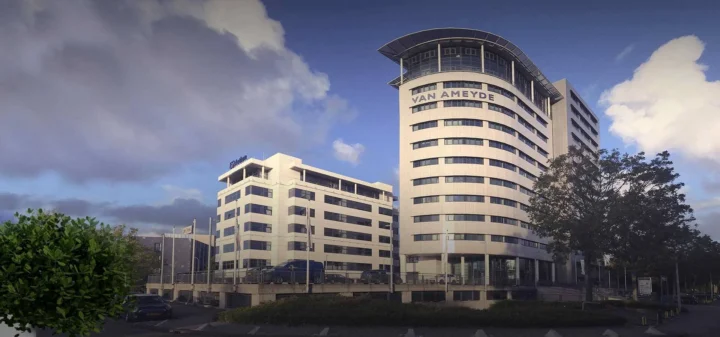 success story modern office building exterior with trees